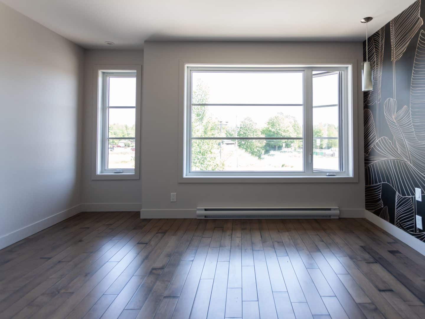 UneDesigned by the St-Lin-Laurentides sales office, this contemporary two-story model is named Mundo. View from the bedroom.