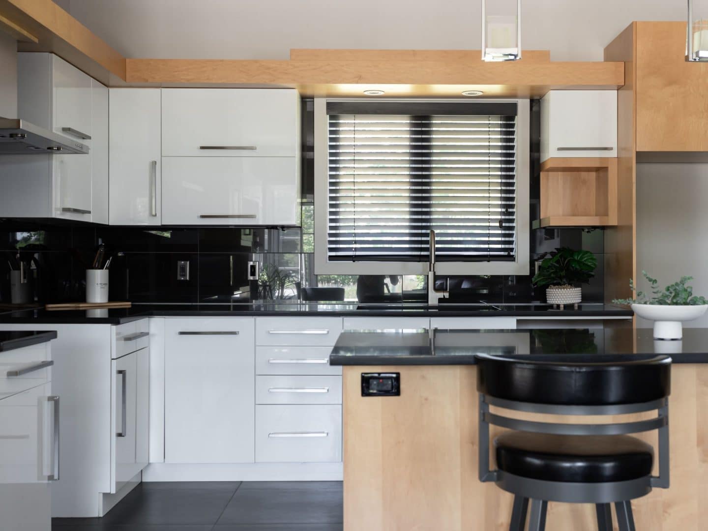 Designed by the St-Lin-Laurentides sales office, this two-story Mundo model is contemporary in style. View from the kitchen.