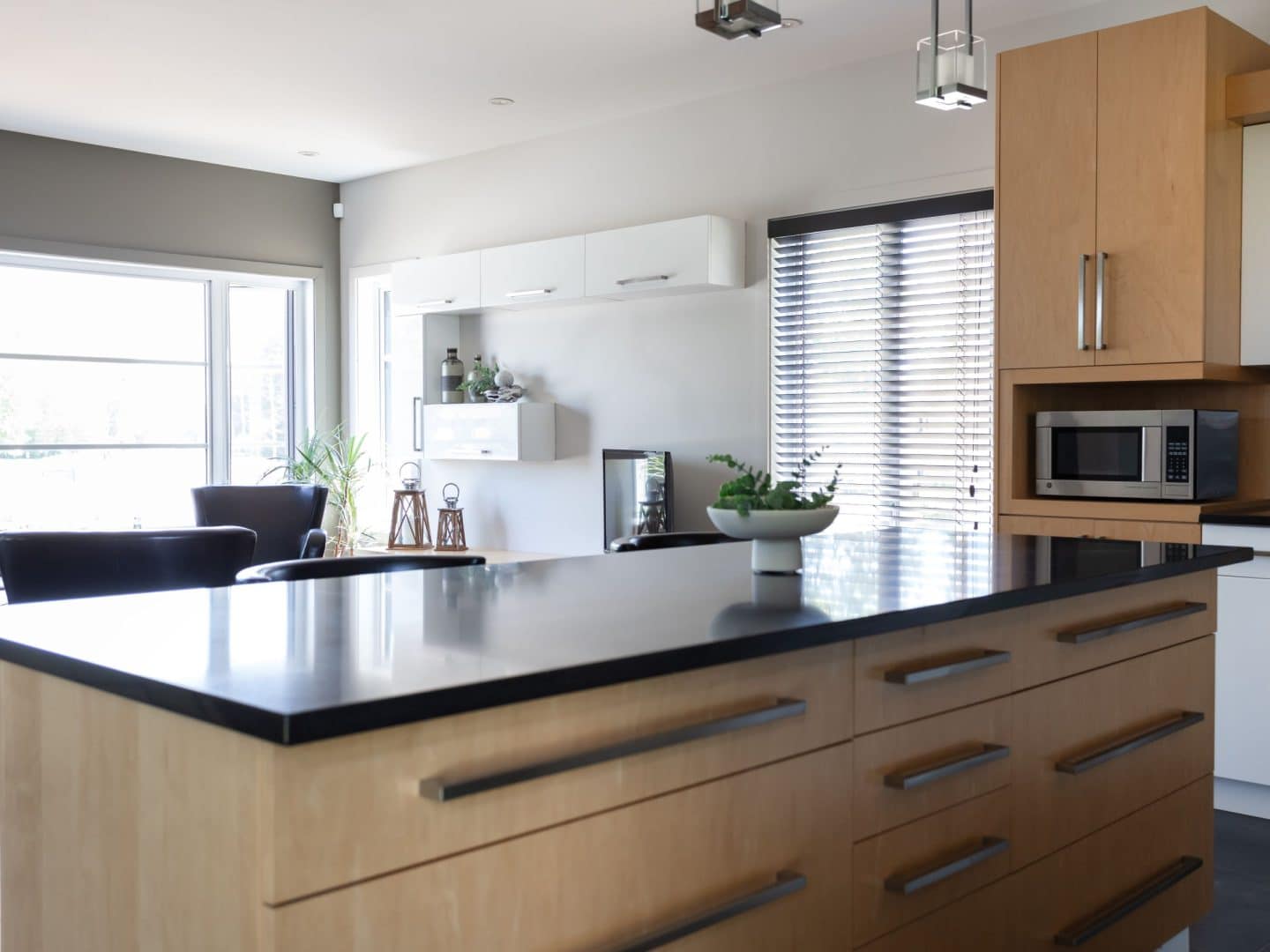 Designed by the St-Lin-Laurentides sales office, this two-story Mundo model is contemporary in style. View from the kitchen.