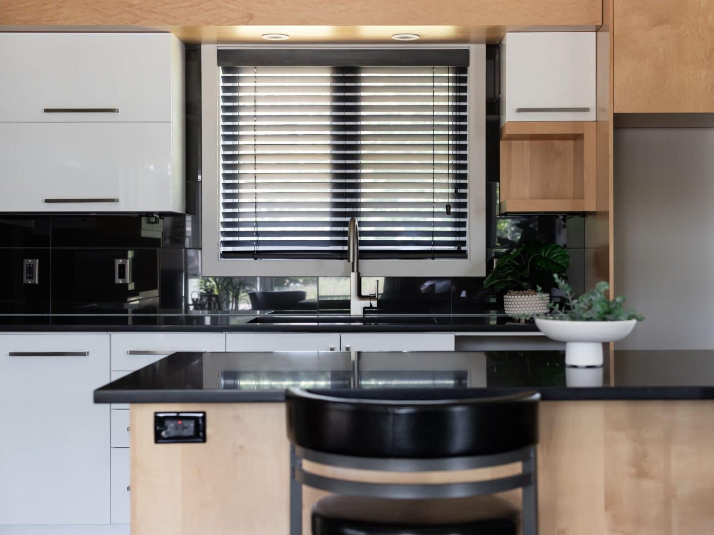 Designed by the St-Lin-Laurentides sales office, this two-story Mundo model is contemporary in style. View from the kitchen.